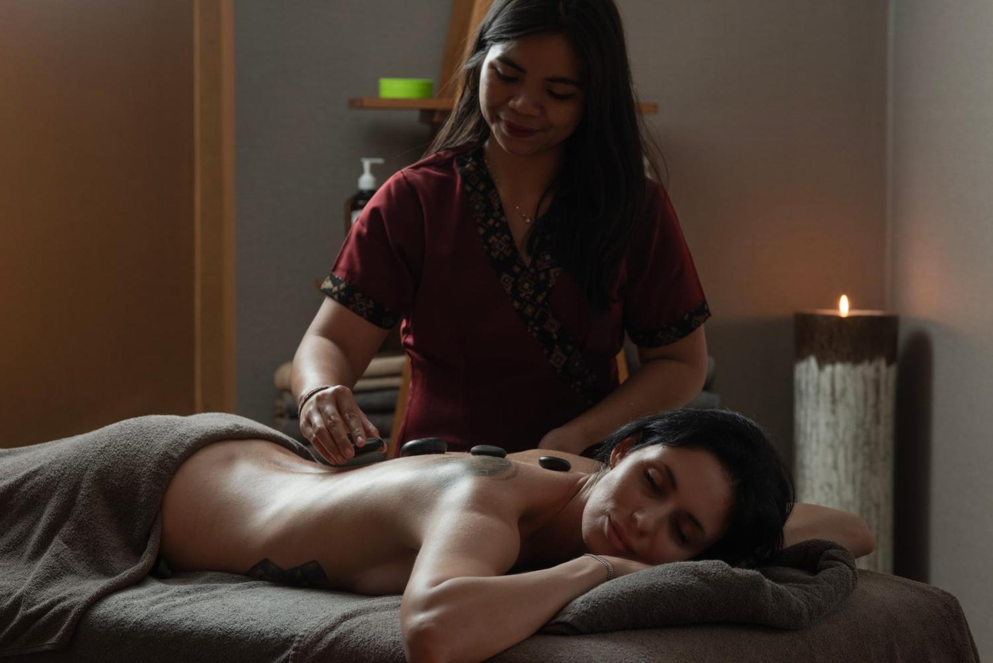 Day One Beach Resort & Spa - Adult Only Alanya Exterior photo A woman receiving a hot stone massage